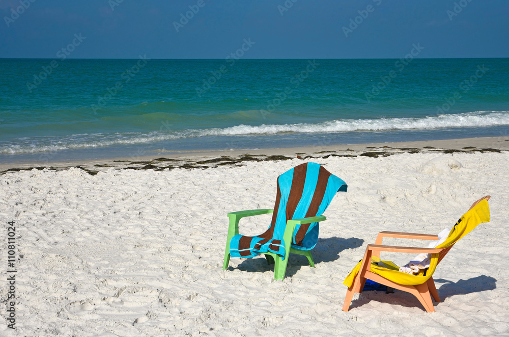 Beach Chairs and Towels on the Beach Beach Chairs and Towels on the Beach