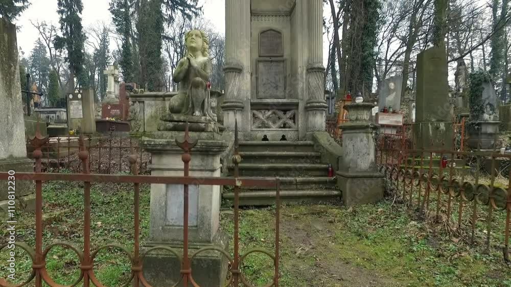 Shooting With the Aircraft Quadrocopter.camera Flies Over the Graves in the Cemetery of the Lviv. Camera Movement on the Crosses and Tombs. Shooting With the Aircraft Quadrocopter.camera Flies Over the Graves in the Cemetery of the Lviv. Camera Movement on the Crosses and Tombs.