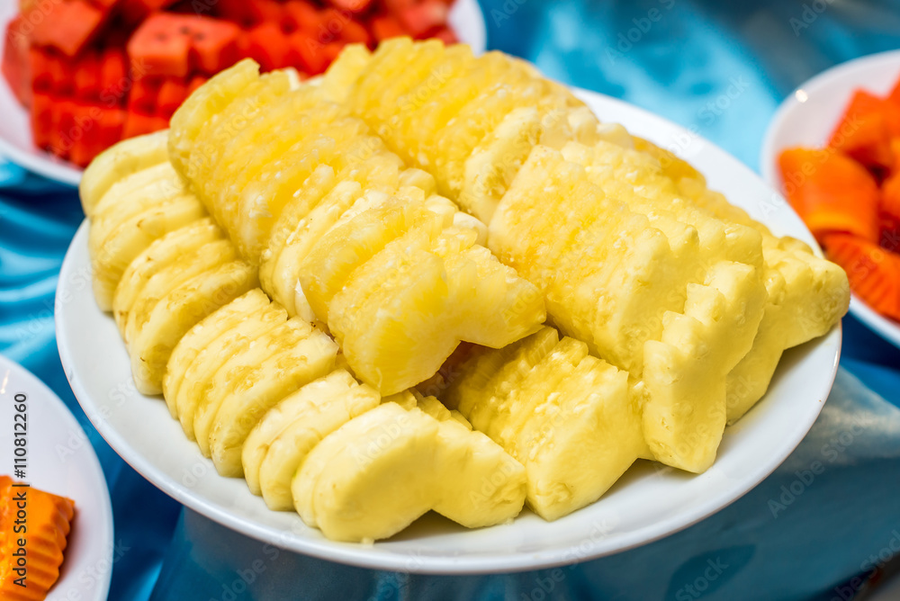 Pineapple slices on a plate Pineapple slices on a plate