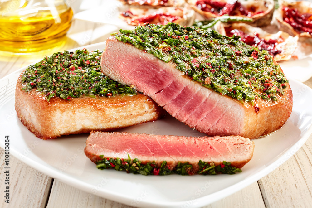 Seared Tuna Steaks Topped with Fresh Pesto Seared Tuna Steaks Topped with Fresh Pesto