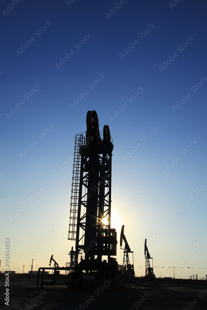 The silhouette of oilfield derrick The silhouette of oilfield derrick