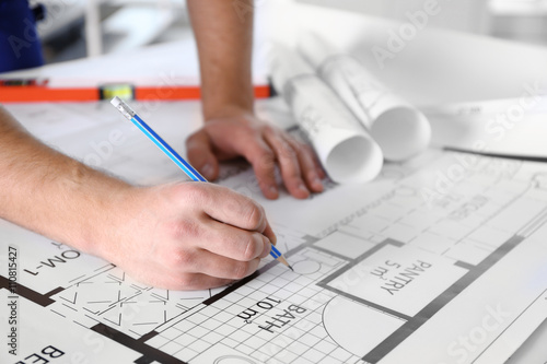 Architect sketching constru...