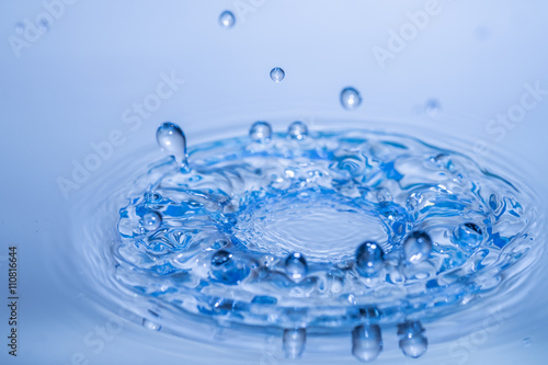 Abstract blue circle water drop ripple. Liquid texture backgroun