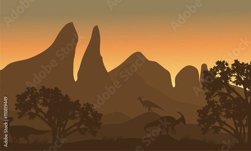 Fotografie, Obraz Silhouette of parasaurolophus in fields