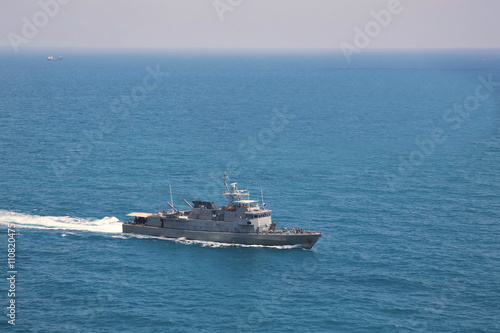 Military navy ships in a sea bay