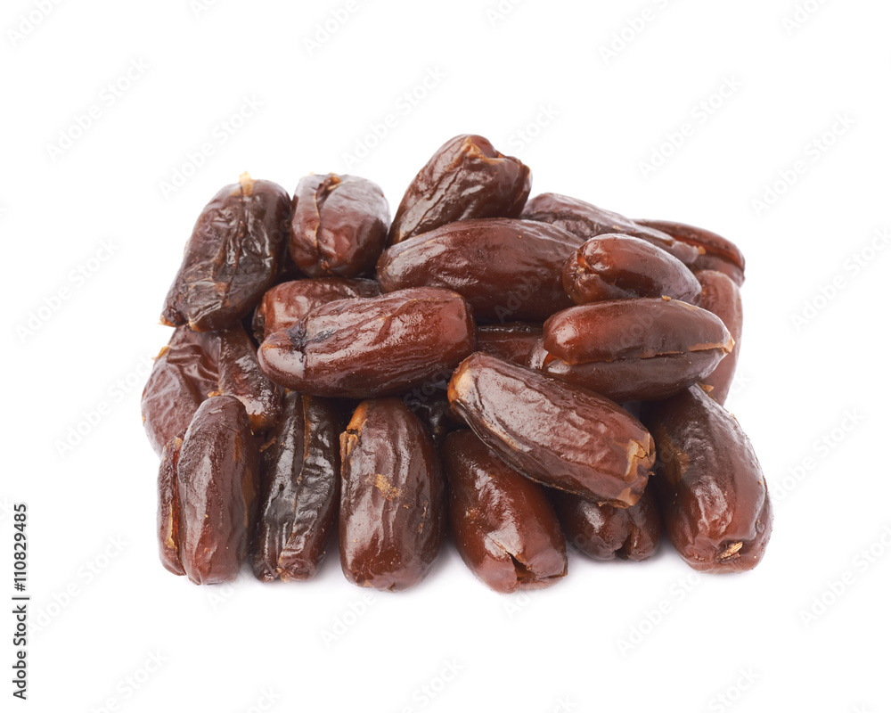 Pile of date fruits over isolated white background surface Pile of date fruits over isolated white background surface