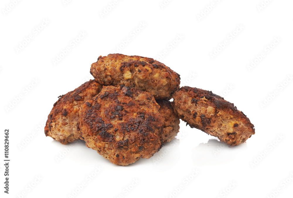 Pile of small hand made cutlets isolated over white background Pile of small hand made cutlets isolated over white background