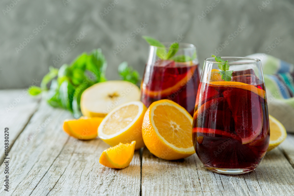 Sangria and ingredients in glasses