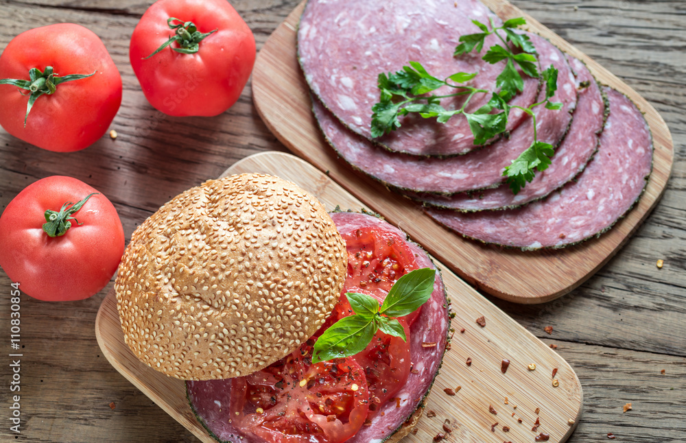 Sandwich with salami and tomatoes Sandwich with salami and tomatoes