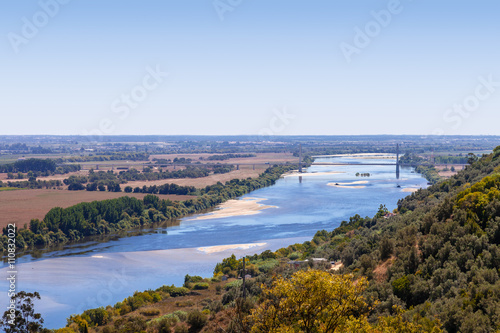 The Tagus River (Rio Tejo), the largest of the Iberian Peninsula, and the Leziria landscape seen from Portas do Sol belvedere. Santarem, Portugal. photo
