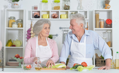 senior man and woman  in the kitchen