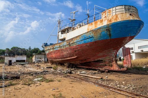 Abandoned fishing ship in a Seixal shipyard. Portugal © StockPhotosArt