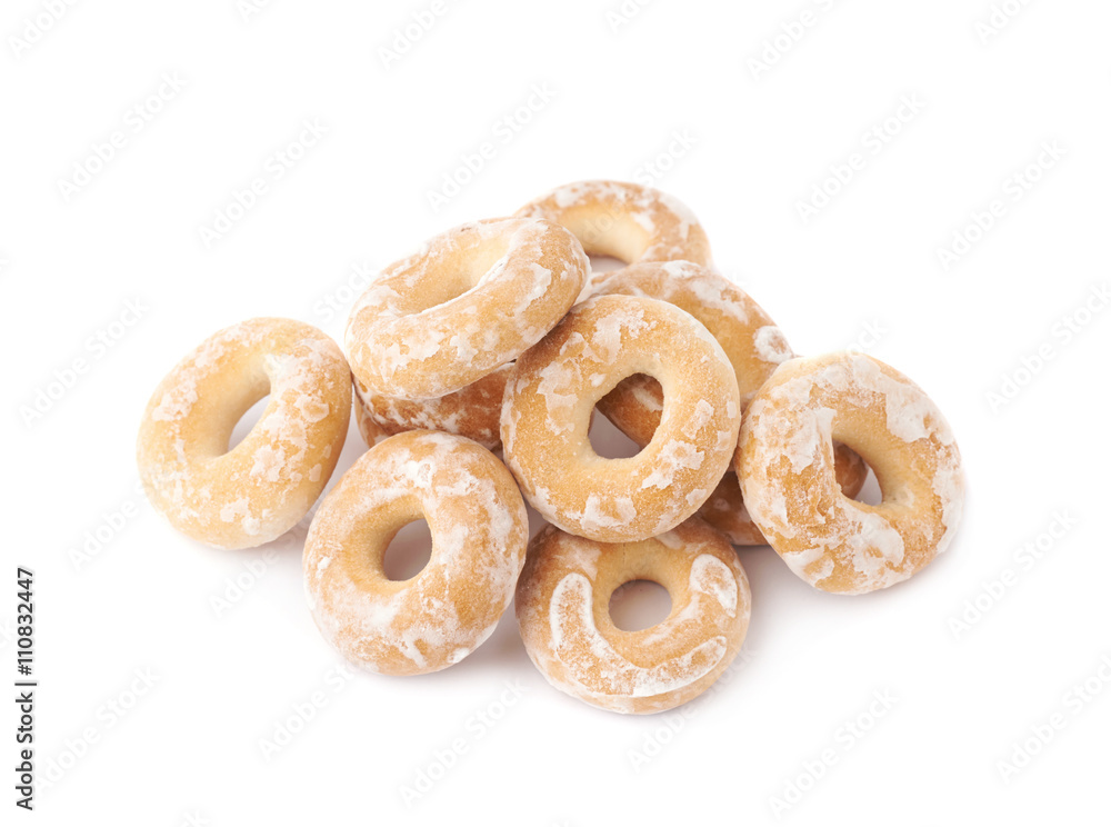 Pile of small cakes with hole isolated over the white background Pile of small cakes with hole isolated over the white background