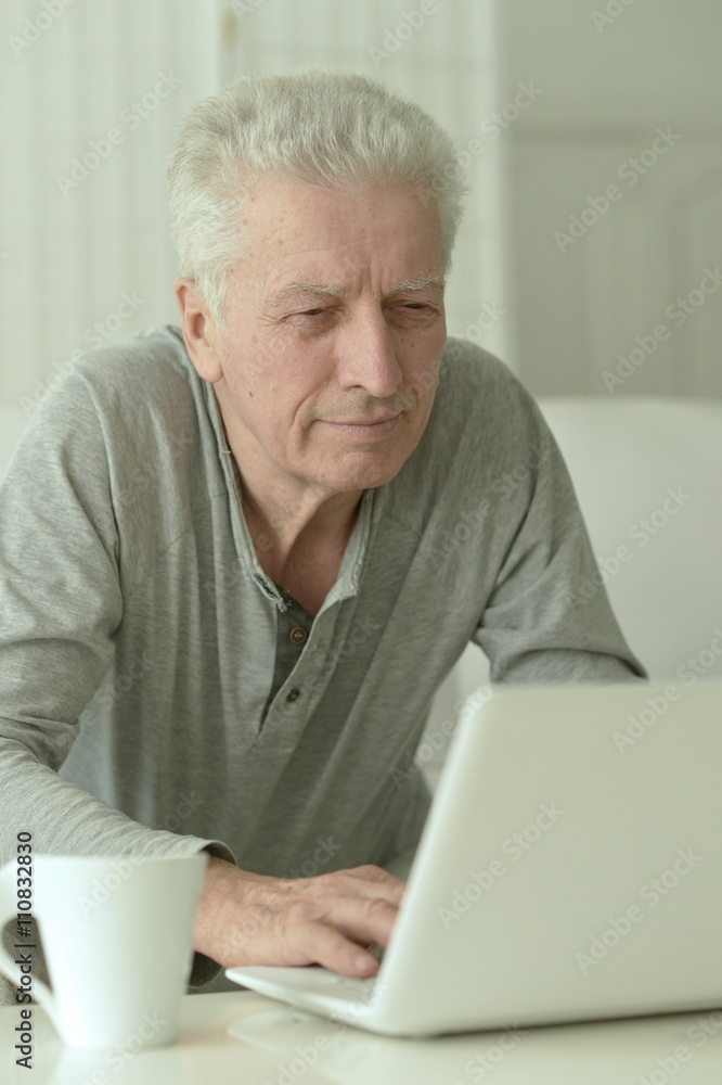 senior man with laptop senior man with laptop