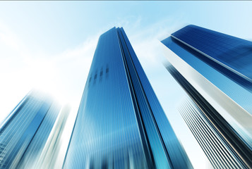 look up modern office building in cloud sky