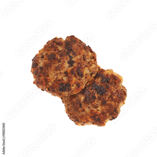 Couple of small hand made cutlets isolated over white background © exopixel