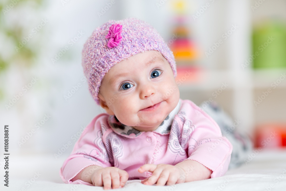 Newborn baby smiling looking at camera Newborn baby smiling looking at camera