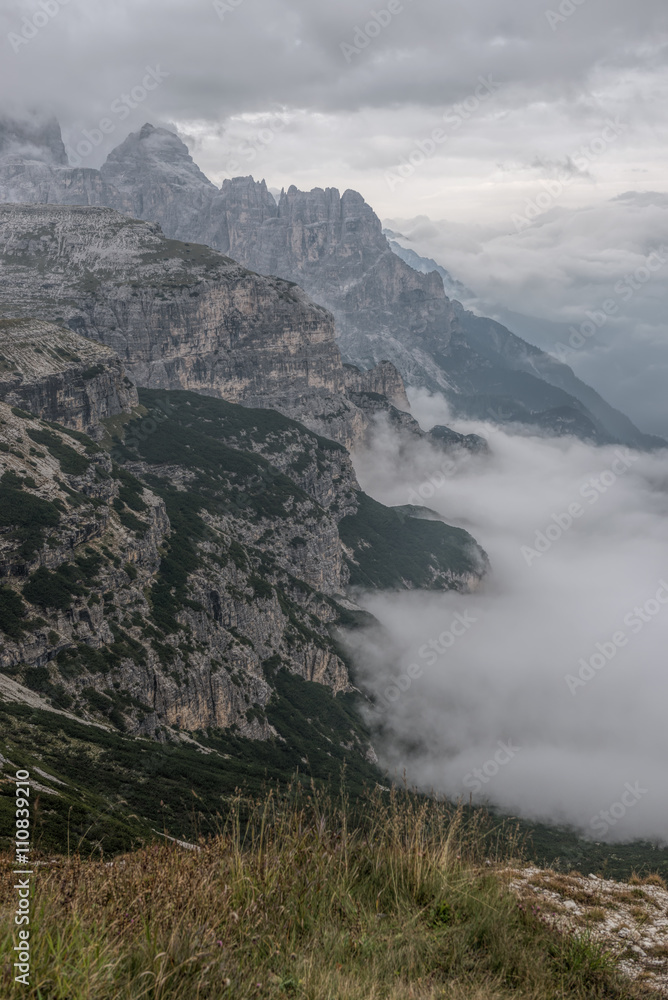 Dolomites landscape, high above the clouds, on top of the rocks Dolomites landscape, high above the clouds, on top of the rocks