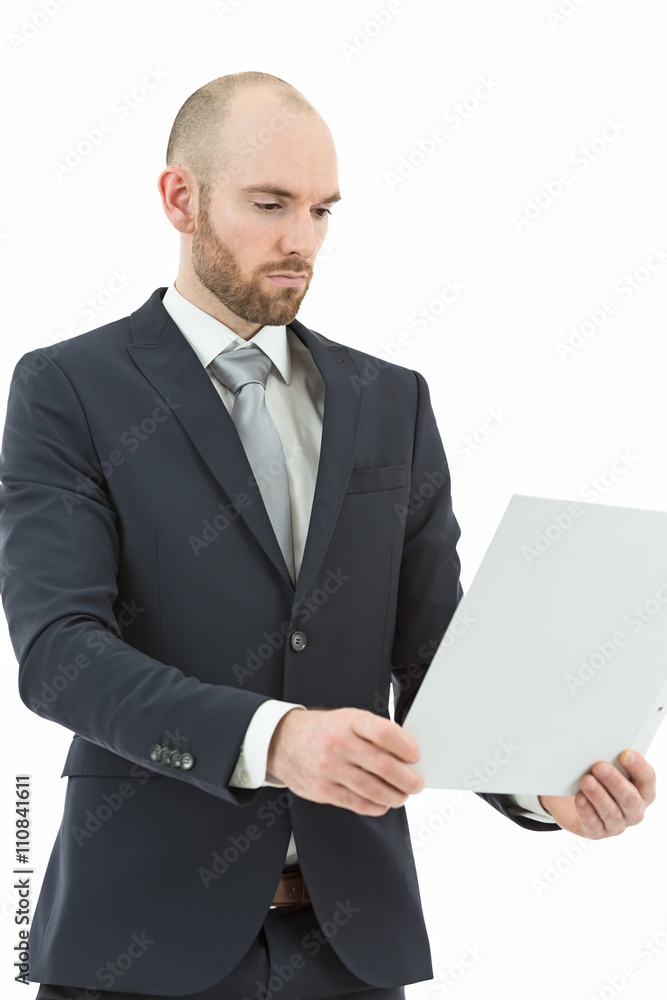 Business man working on a file Business man working on a file