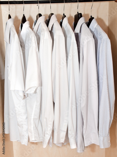 Men's shirts on hangers