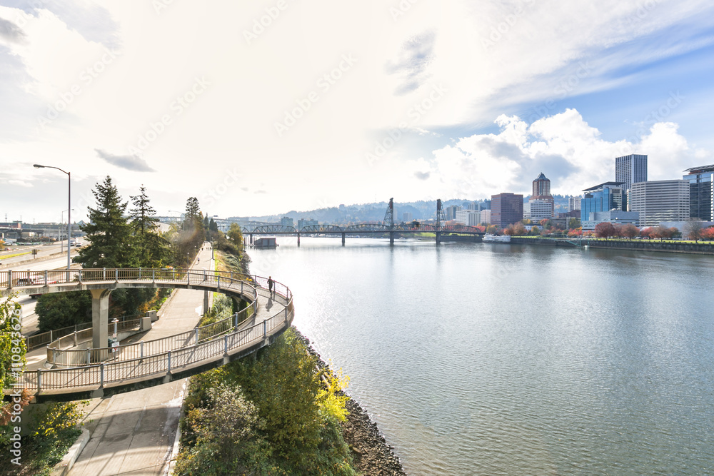 river,pedestian bridge with cityscape and skyline of portland