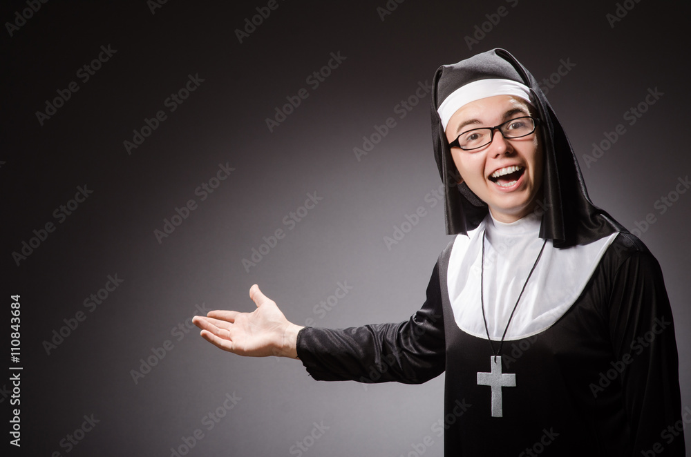 Funny man wearing nun clothing - obrazy, fototapety, plakaty 