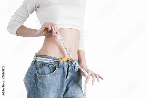 Bild auf Leinwand Fit woman standing. Loose weight concept
