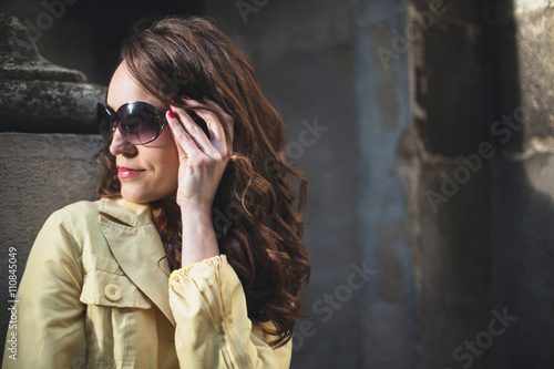 Girl in black glasses looking mysterious