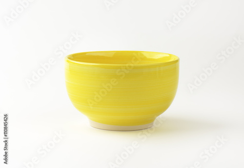 Deep footed yellow bowl