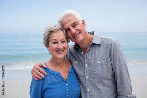 Happy senior couple embracing each other on the beach © WavebreakMediaMicro