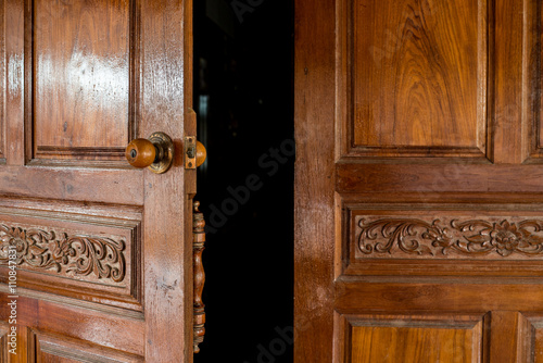 open door to dark and mysterious inside