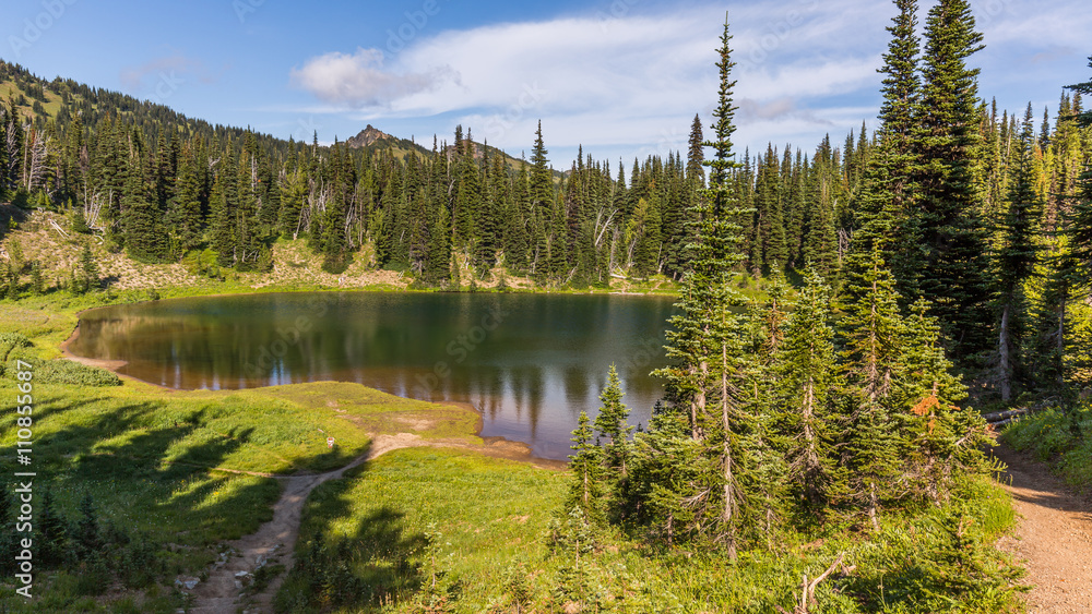 Clear forest lake in the mountains. Mount Rainier, Sunrise Area SHADOW LAKE TRAIL