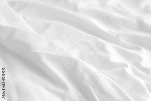 white wrinkle bed sheets