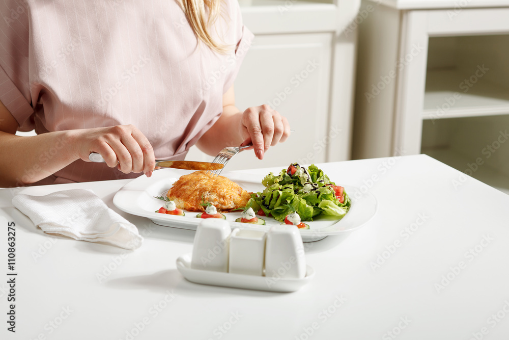 Fried beef with salad on white table. Stock image. Horizontal