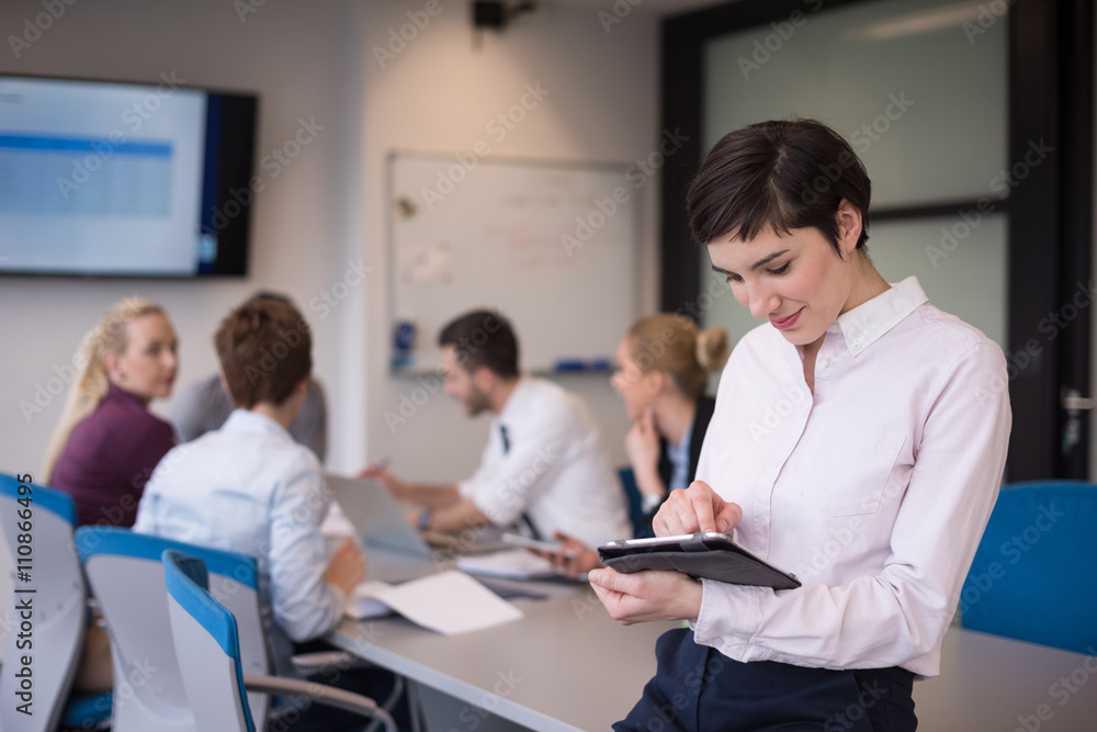 business woman on meeting  using tablet