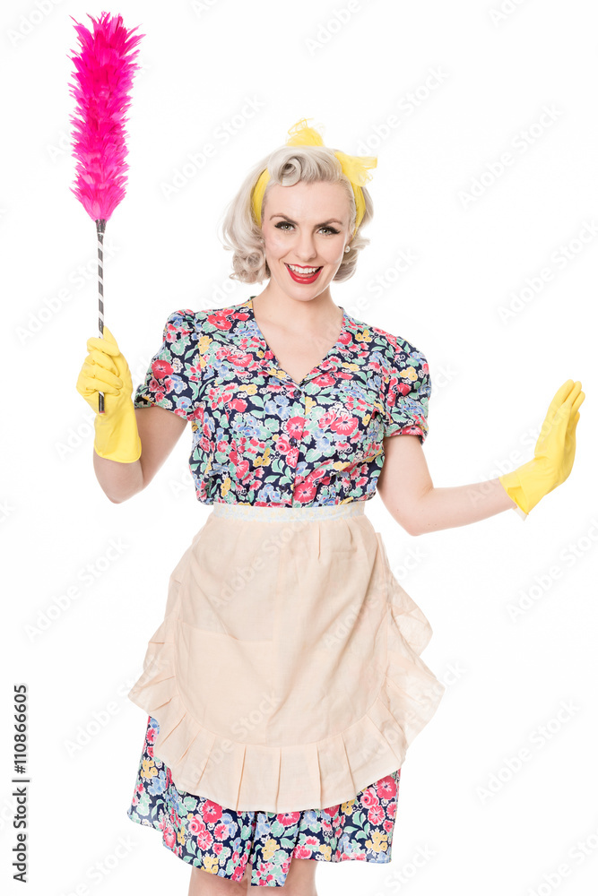 happy retro housewife, with feather duster, isolated on white happy retro housewife, with feather duster, isolated on white