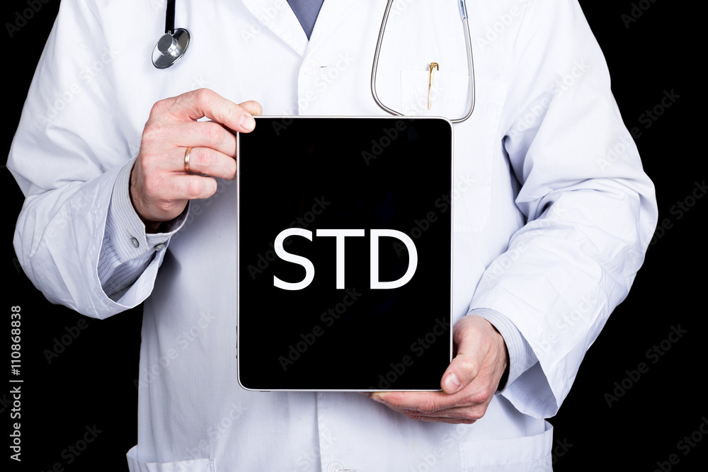 technology, internet and networking in medicine concept - Doctor holding a tablet pc with std sign. Internet technologies in medicine technology, internet and networking in medicine concept - Doctor holding a tablet pc with std sign. Internet technologies in medicine