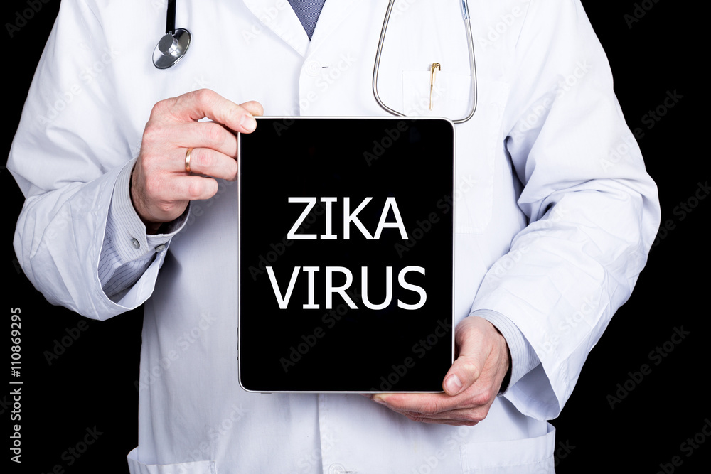 technology, internet and networking in medicine concept - Doctor holding a tablet pc with zika virus sign. Internet technologies in medicine technology, internet and networking in medicine concept - Doctor holding a tablet pc with zika virus sign. Internet technologies in medicine