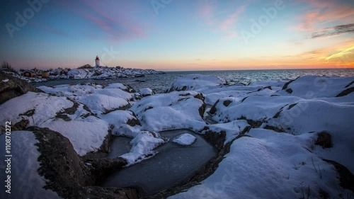 Winter in the Stockholm archipelago, Sweden. Sunset by Landsort Lighthouse, Sweden´s oldest lighthouse photo