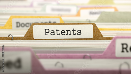 File Folder Labeled as Patents in Multicolor Archive. Closeup View. Blurred Image. 3D Render. photo