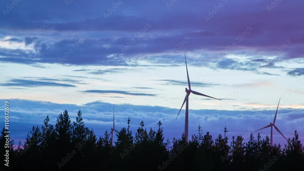 Motion Time lapse of Wind Power Park in Sweden in Sunset Motion Time lapse of Wind Power Park in Sweden in Sunset