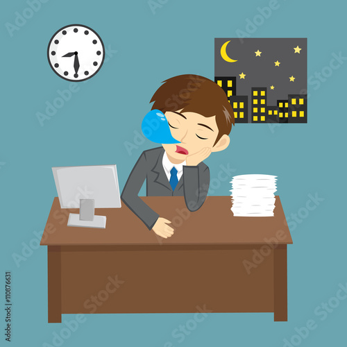 Businessman Working Late And Sleeping In Office