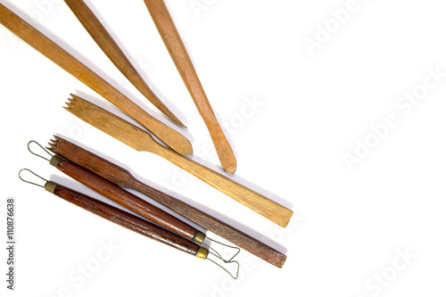 Carving tools, pottery white background