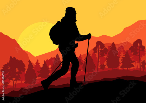 Man hiking in mountains adventure nordic walking with poles in n