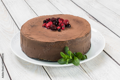 Chocolate cake with Ganache and berries fruit