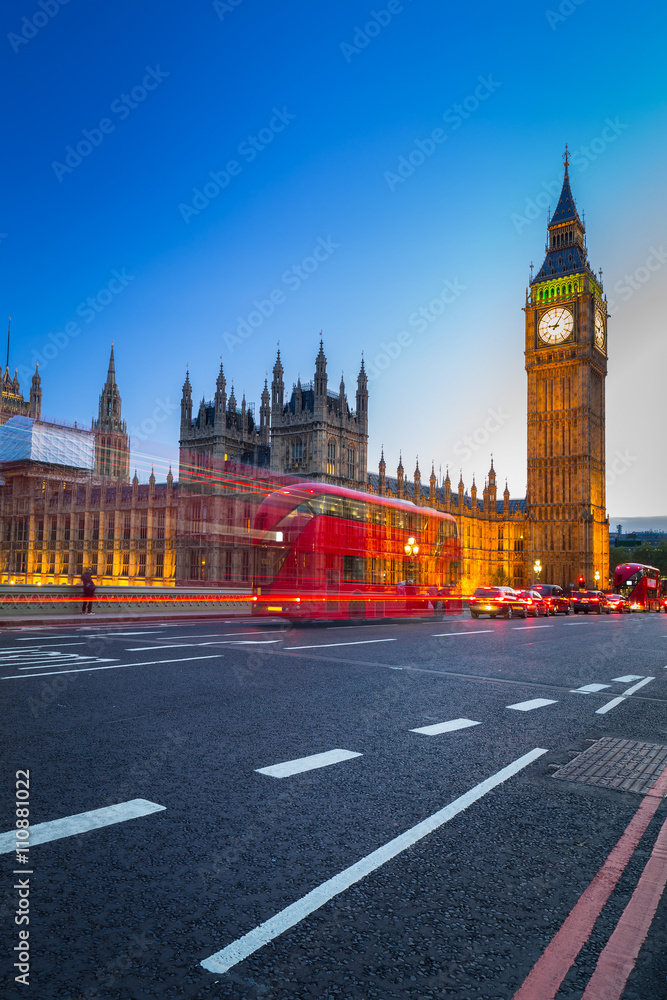 London scenery at Westminter bridge with Big Ben and blurred red