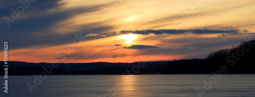 Beautiful picture of the amazing sunset on the lake