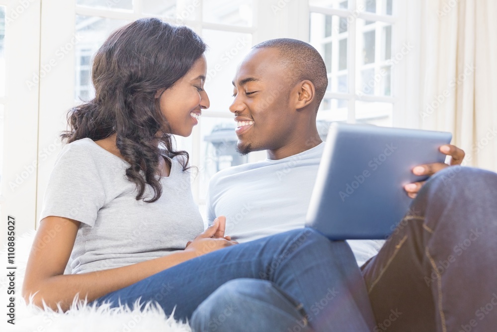 Young couple using a laptop