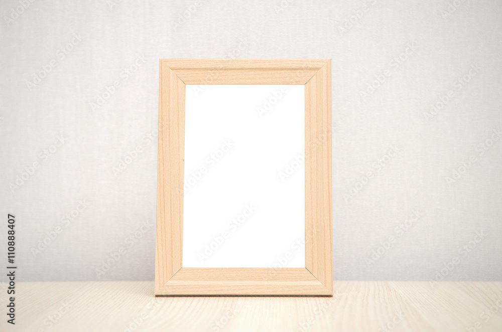 blank wood picture frame on the wall and the table wood blank wood picture frame on the wall and the table wood