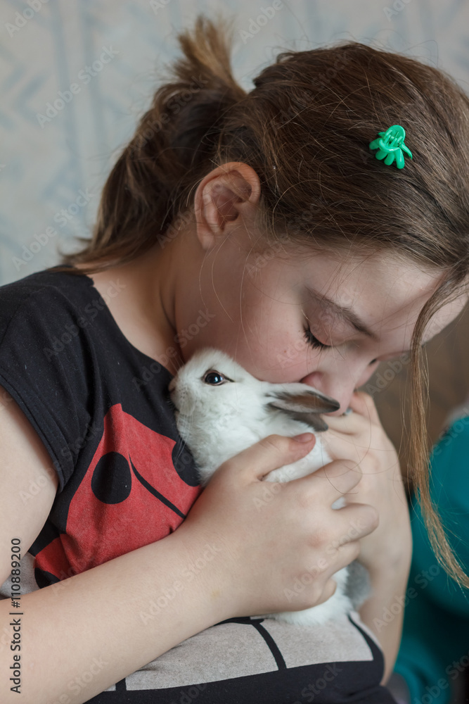 Girl with little bunny rabbit Girl with little bunny rabbit